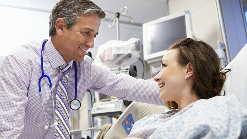 Doctor speaking to patient