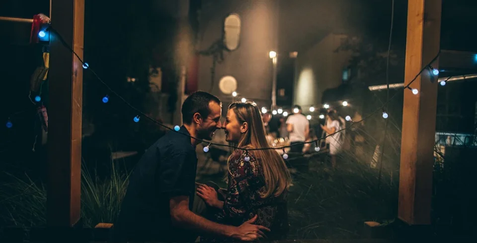 a man and woman kissing