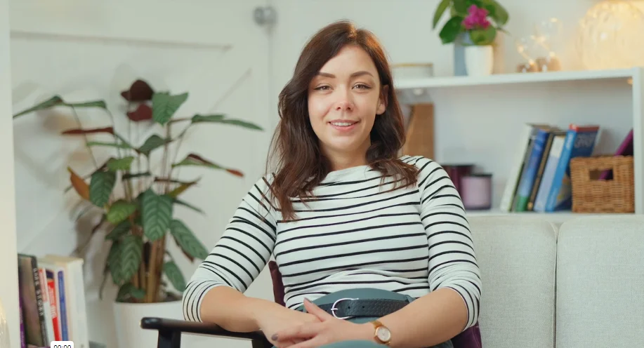 a woman holding a phone